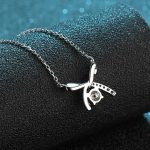 ribbon-round-moissanite-pendant-1