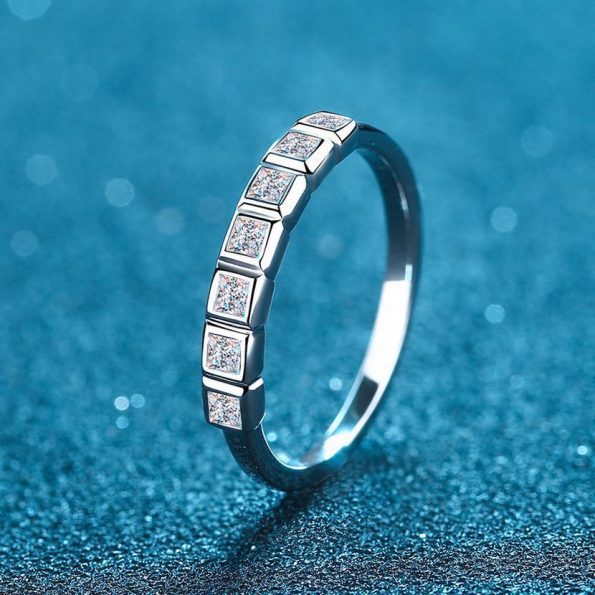 Seven Princess Bezel Moissanite Band