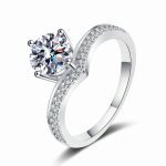 Chevron Shaped Accented Round Moissanite Ring