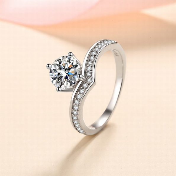 Chevron Shaped Accented Round Moissanite Ring