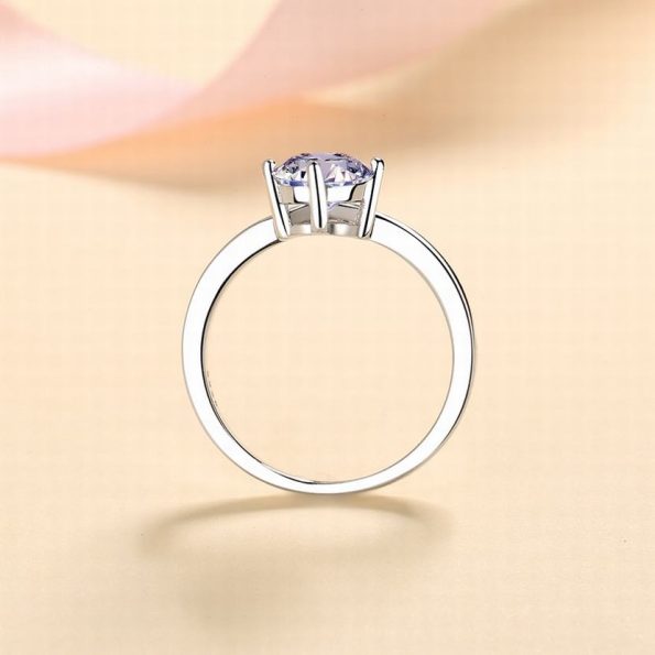 Chevron Shaped Accented Round Moissanite Ring