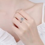 chevron-shaped-accented-round-moissanite-ring-1